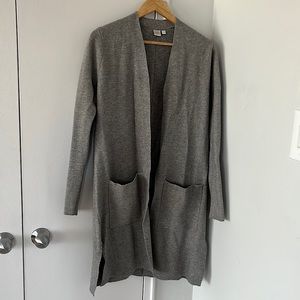 Long, light grey cardigan. Knee-length, warm and stylish. Never worn.